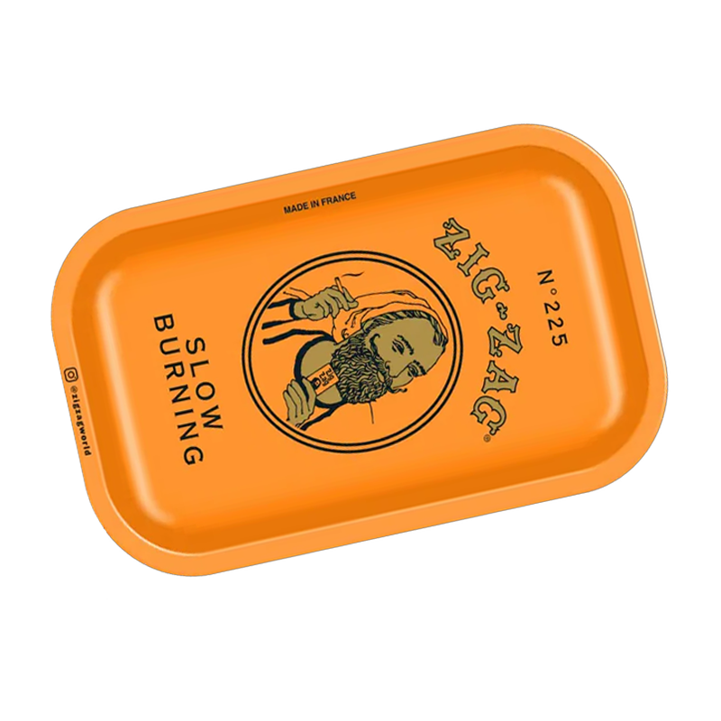 Metal Rolling Tray in Raw, Zig Zag (Black) and Zig Zag (Slow Burning) designs, featuring raised edges and durable metal surface for easy herb rolling.